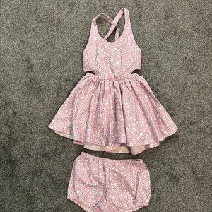 Little People Rocx light purple with white and dark purple flowers pinafore